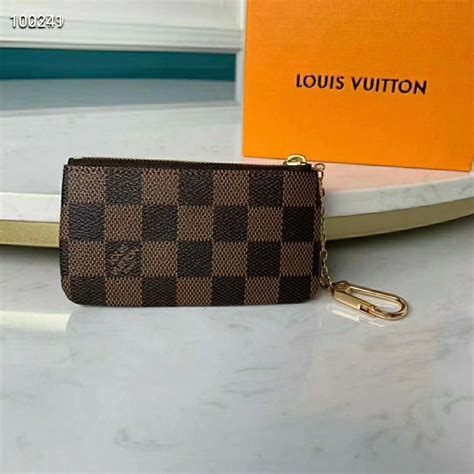 louis vuitton key pouch bijenkorf|louis vuitton lv keychain.